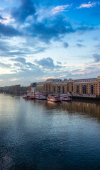 Wall Mural - View of River Thames and City Skyline during dramatic sunrise. City of London, UK