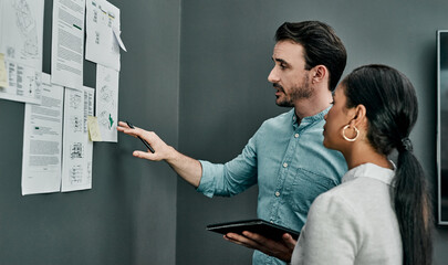 Poster - Architecture, man and woman at wall for discussion, project management or development in office with tablet. Planning, blueprint and design team at board for engineering, brainstorming or digital app