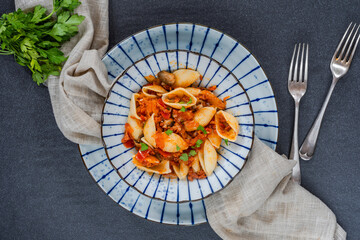 Canvas Print - Pasta shells with tomato, mushrooms and chorizo sauce