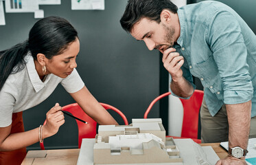 Wall Mural - Woman, man and scale model at architecture agency with review, discussion and planning with teamwork. Engineer, partnership and 3D building with blueprint, feedback or inspection for property company