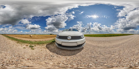 Wall Mural - hdri 360 panorama near white car on roadside of gravel dusty road in field with blue sky and awesome clouds in equirectangular full seamless spherical projection, for VR AR content