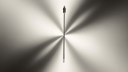 a sleek metallic arrow placed in the center of a radiant