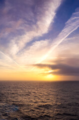 Wall Mural - Dramatic Colorful Sunrise Sky over North Atlantic Ocean.