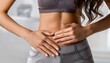 © juanorihuela - Close-up of a flat female abdomen with a slim young woman placing her hands on her stomach. Healthy life concept. Possible menstrual pain.