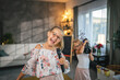 © Miljan Živković - young girl child make a karaoke party with microphone and loudspeaker