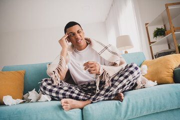 Sticker - Photo of depressed sad guy nightwear pajama having rest couch feeling headache indoors room home house