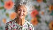 © KKC Studio - Serene Elderly Woman with Kind Smile in Floral Dress Poses in Bright Studio