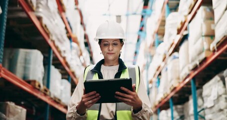 Canvas Print - Warehouse, walking and woman on tablet for shipping, delivery and inspection in factory. Ecommerce, distribution and worker on digital tech with shelves of packages in manufacturing and supply chain