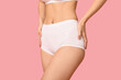 © Pixel-Shot - Young woman in underwear on pink background. Epilation concept