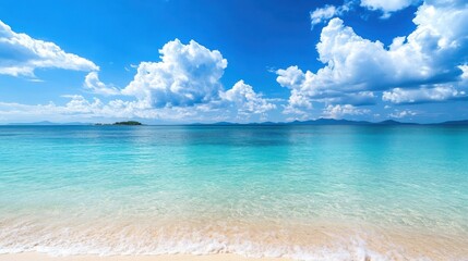 Poster - Tranquil Beach Scene with Blue Sky and White Clouds