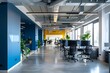 © TheseusStock - Modern office interior with blue walls, white ceiling and concrete floor. There is an open space working area for several people to work together in the center of room.