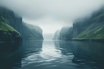 A serene lake in the Faroe Islands surrounded by green cliffs