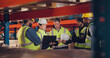© Azee Jacobs/peopleimages.com - Employees, tablet and group in warehouse, teamwork and inventory with connection. People, factory and supervisor with tech, cooperation and conversation with communication, planning and logistics