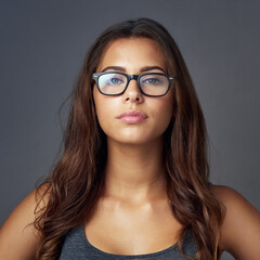 Sticker - Eye care, woman and face on studio for confidence, attitude and designer optometry brand. Female person, glasses and portrait on dark background with prescription lens, new frames and aesthetic