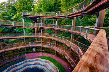 Sticker - Unusual summer view of observation deck in Natural Heritage Centre Rugen. Splendid morning scene of foliage woodland. Beauty of nature concept background..