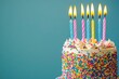 © MUdaylah - Celebration birthday cake with colorful sprinkles and twenty one colorful birthday candles with copy-space with generative ai