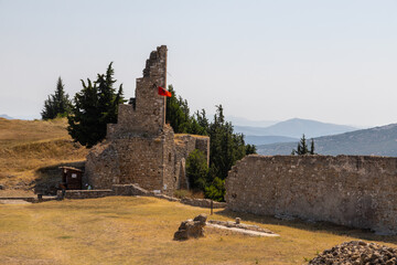 the ruines of Kaninë Castle which was built in the nearby village and the city of Vlore. It is located on the side of the Shushicë Mountain, about 380 metres above sea level and has views on the ocean