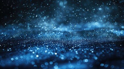 Wall Mural - Blue Particles Floating in Dark Sky Background - Starry Night Space Theme