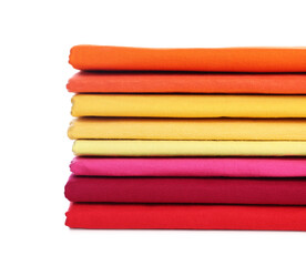 Poster - Stack of clean colorful t-shirts isolated on white