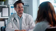 © KidSpace - Happy firendly doctor having a consultation with a patient.