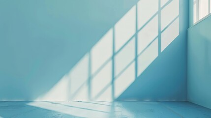 Wall Mural - Sunlight streams through large windows onto a serene blue wall, casting intricate shadows and creating a peaceful, minimalist ambiance in an empty room.