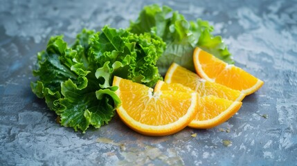 Poster - Freshly sliced oranges paired with crisp lettuce on a textured, grey surface.