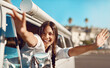 © Hira/peopleimages.com - Freedom, portrait and woman in minivan window for drive, travel and road trip for adventure in Spain. Female person, car and happy for summer holiday on journey for fun, relax or enjoy as passenger