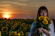 © Олег Мальшаков - Beautiful young girl in a white dress in sunflowers