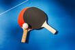 © Maria Vitkovska - Pair of two table tennis or ping pong paddles or rackets with table tennis ball