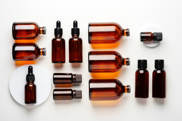 Wall Mural - Mock up of amber glass bottles on white background flat lay