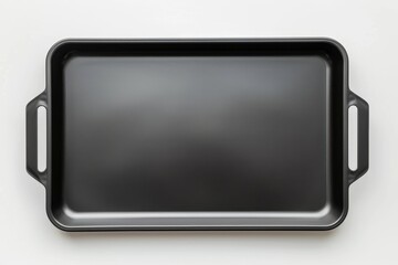 Wall Mural - Top view of isolated black rectangular non stick oven tray in white background empty