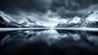 © Narongsak - A mountain range is reflected in a body of water. The sky is dark and cloudy, creating a moody atmosphere