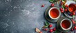 © HN Works - Grey table with fresh rose hip tea berries in flat lay copy space image