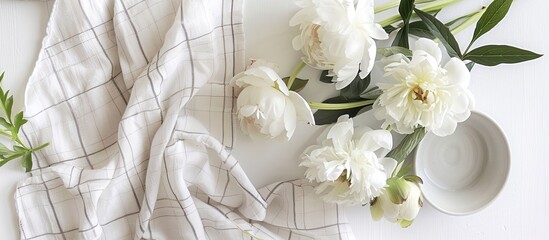 Aufkleber - A summer themed flat lay with white peonies and a checkered linen plaid set on a white background featuring a healthy garden tea time picnic concept along with ample copy space for a text or image