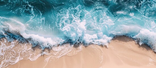 Sticker - Tropical waves create a scenic ocean background with a sandy shore white foam and a serene natural view suitable for a copy space image