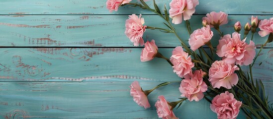 Poster - Wooden background features a blank card with lovely pink carnations perfect for Mother s Day or spring greetings providing a beautiful copy space image