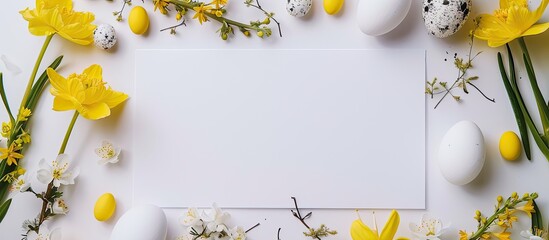 Aufkleber - High quality flat lay photo of Easter themed composition featuring yellow flowers Easter eggs and a paper blank on a white background with ample copy space image