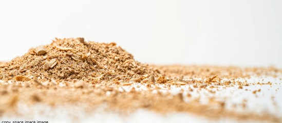 Wall Mural - Sawdust from wood on a white backdrop with empty space for text or images commonly known as a copy space image