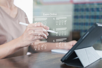 Wall Mural - online exam and learning, education technology concept, women choose correct answer and check on exa