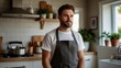 © Yendi08 - Man in Apron in Modern Kitchen