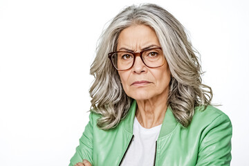 Sticker - Mature woman with serious expression wearing glasses