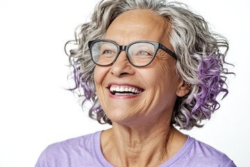 Wall Mural - Portrait of a smiling senior woman with glasses and purple hair