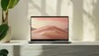 © Dara - Laptop screen mockup with customizable display in an office setting.