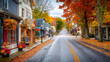 © Hanna - Autumn leaves blanket the quiet street of a charming small town in October