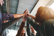 © StarDweller/peopleimages.com - Group, students and high five with people, happy or excited in celebration for diversity at college. Friends, men and women in scrum, circle and synergy for education, learning or inclusion in Canada