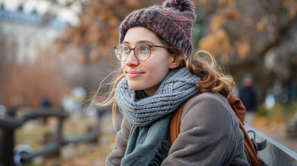 Wall Mural - young woman in winter outfit at the park