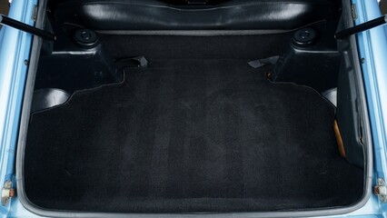 Poster - Black carpet in a trunk