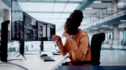 Wall Mural - unhappy sad developer programmer woman in stress coding software on computer