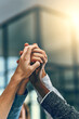 © JordaanExams/peopleimages.com - Solidarity, business people and hands in office for diversity, inclusion and acceptance for equal opportunity. Flare, employees or celebration with trust for group, awareness and support for teamwork