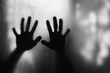 © Nastia - Hands on glass shadow. Halloween horror ghost illustration.